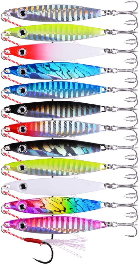 Assorted colorful fishing lures with hooks on a white background

